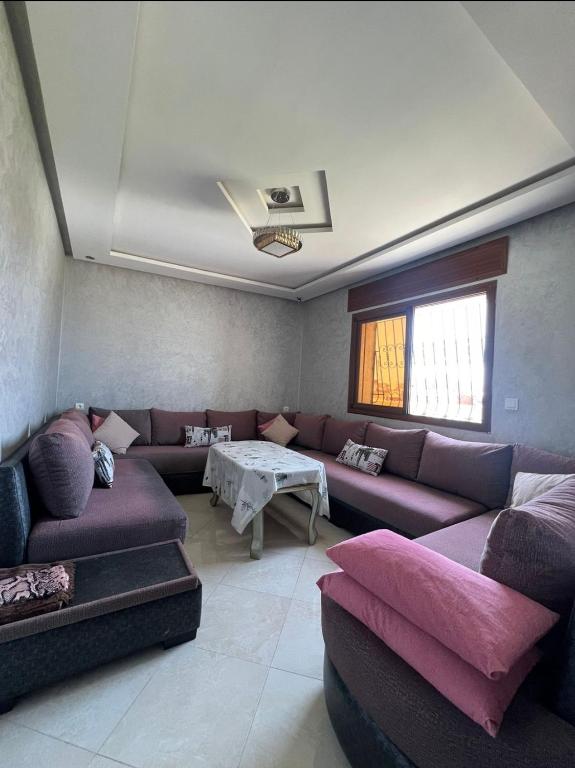 Posezení v ubytování Charmant appartement bien situé.