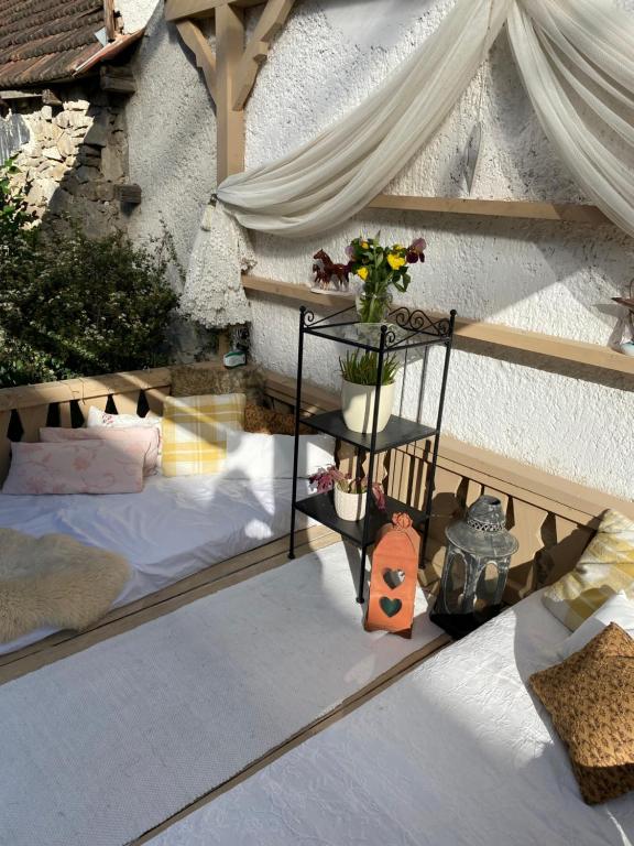 Łóżko lub łóżka w pokoju w obiekcie Kánya Veranda