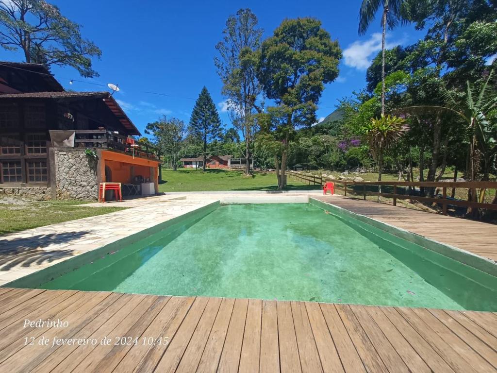 The swimming pool at or close to Rancho do Beto