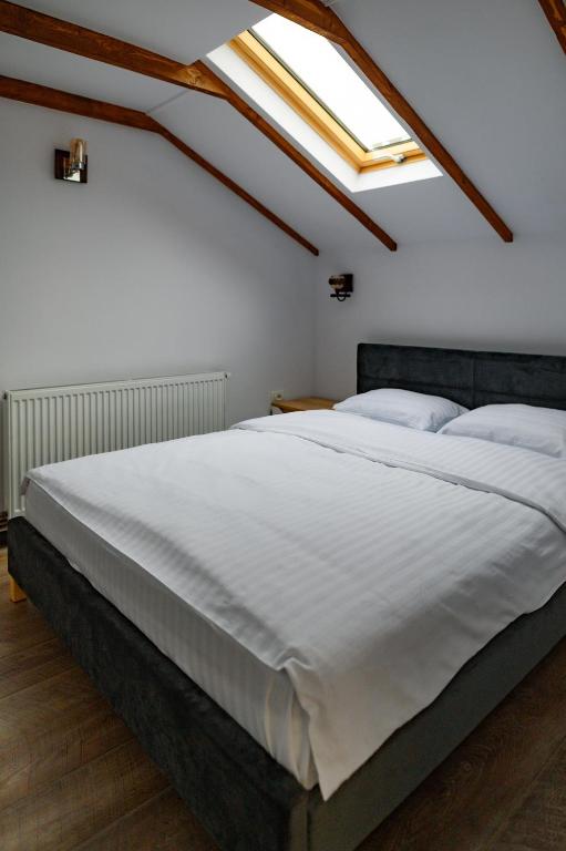 Postel nebo postele na pokoji v ubytování Luxury attic