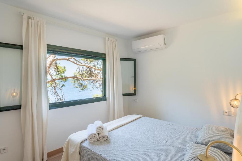 Кровать или кровати в номере Villa Banyalbufar