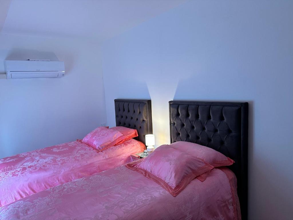 Posteľ alebo postele v izbe v ubytovaní Saint dénis Appartement 1