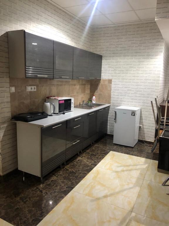 Kuchyňa alebo kuchynka v ubytovaní Apartmánový Wellness Garni Hotel Relax