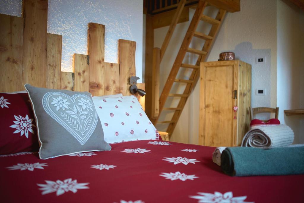 Postel nebo postele na pokoji v ubytování Natural Lodge Maso Baseta