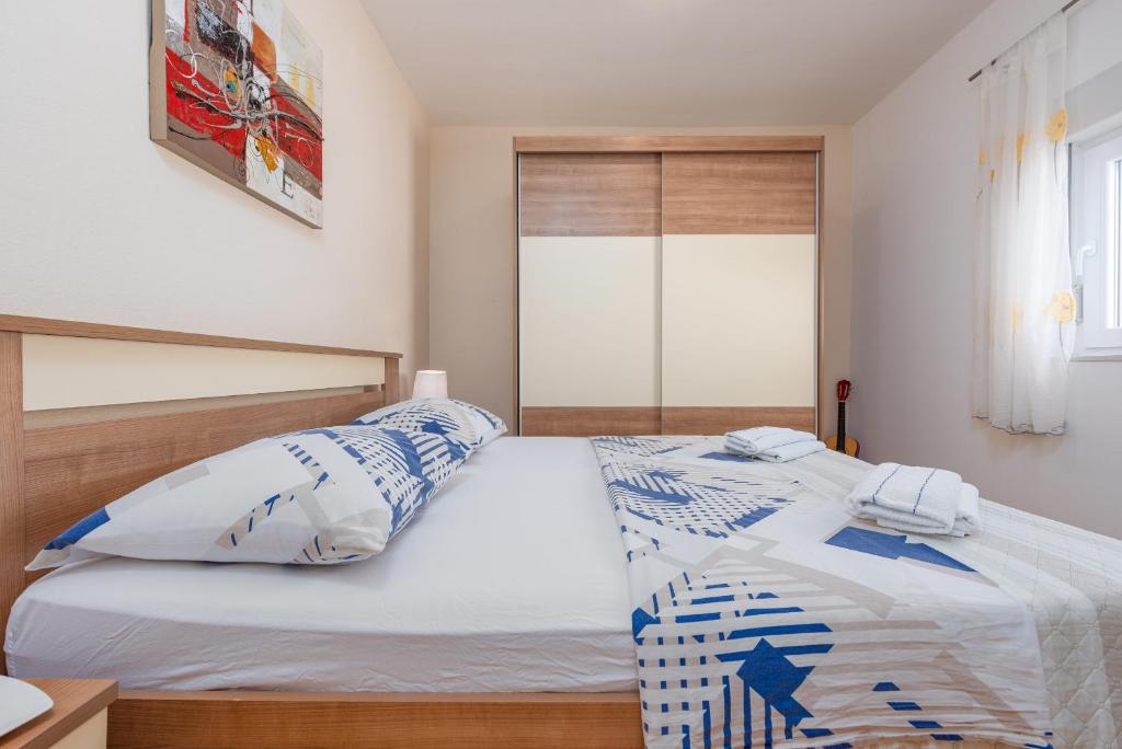 Postel nebo postele na pokoji v ubytování Villa Andu ZadarVillas