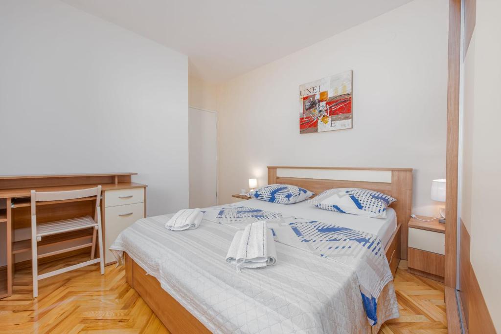 Postel nebo postele na pokoji v ubytování Villa Andu ZadarVillas
