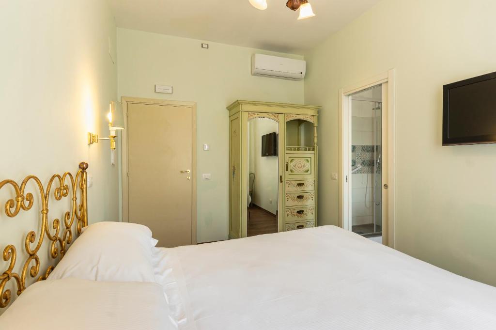 Postel nebo postele na pokoji v ubytování Boutique Hotel Heritage