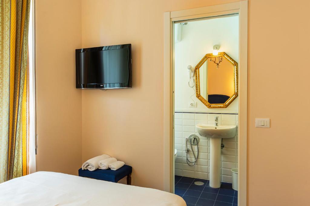 Postel nebo postele na pokoji v ubytování Boutique Hotel Heritage
