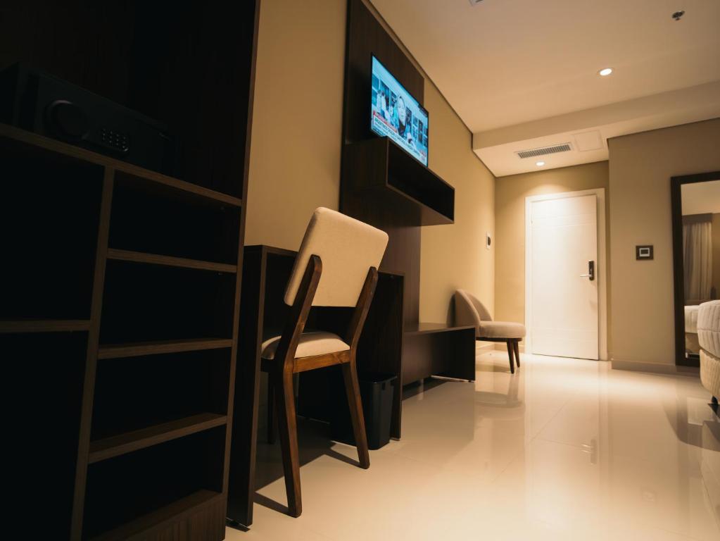 TV a/nebo společenská místnost v ubytování Zielo Hotel