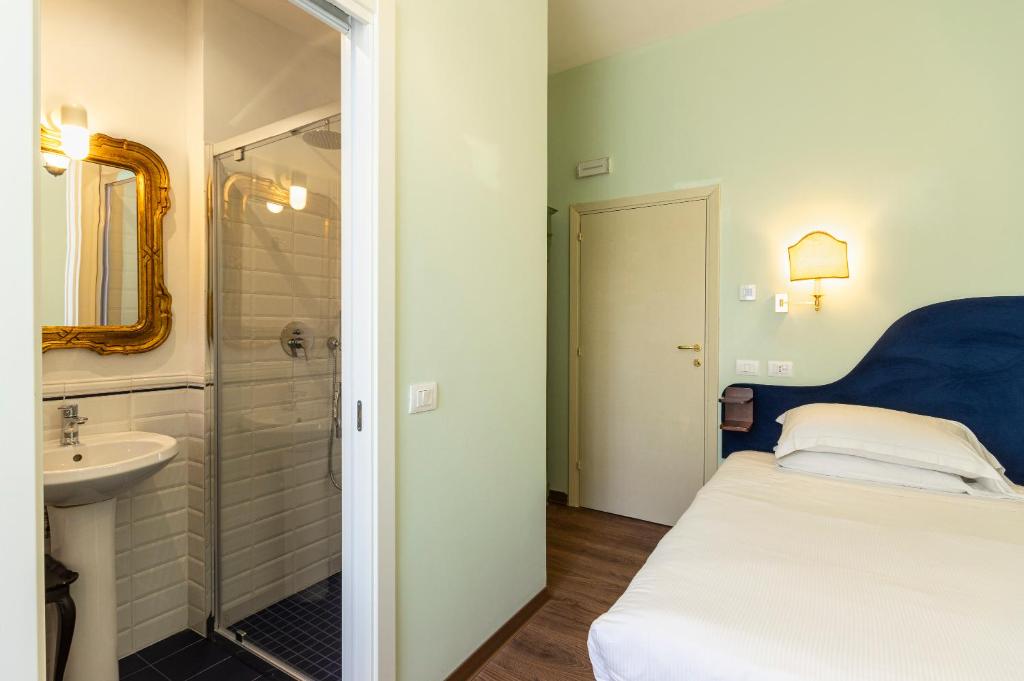 Postel nebo postele na pokoji v ubytování Boutique Hotel Heritage