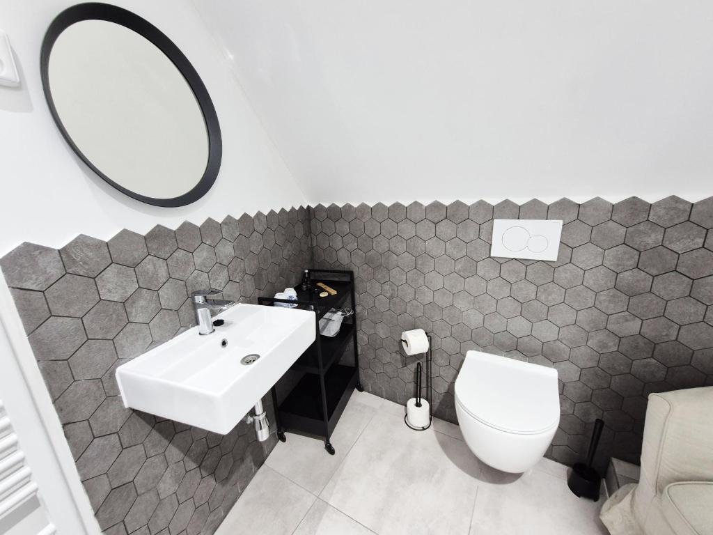 Koupelna v ubytování Hotel Desatero