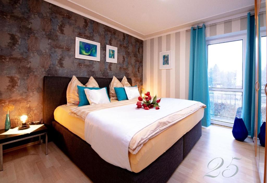 Posteľ alebo postele v izbe v ubytovaní Komfortables Appartement in Bad Kötzting mit Eintritt in die Bade- und Saunawelt