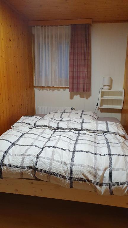 Postel nebo postele na pokoji v ubytování Chalet Falk