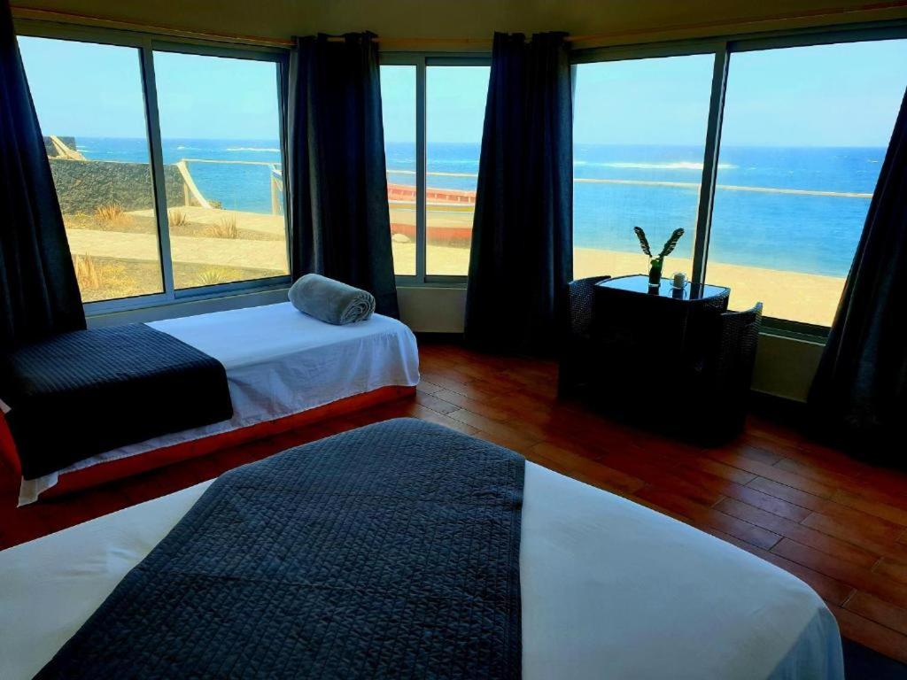 Postel nebo postele na pokoji v ubytování Hotel Salinas São Jorge