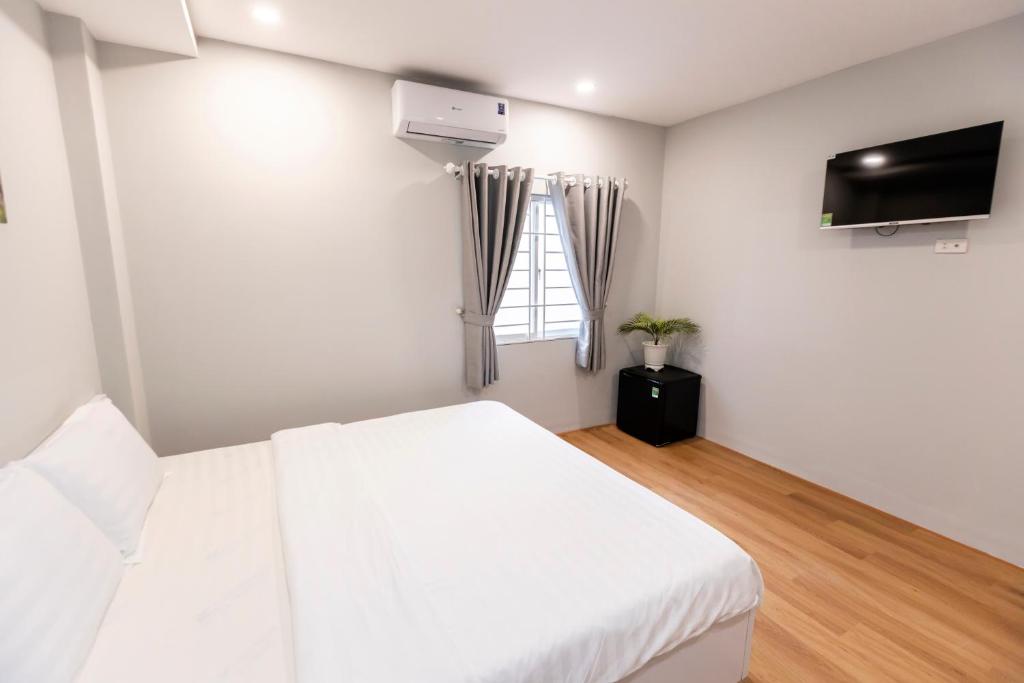 TV/trung tâm giải trí tại Cosmos Hotel Nha Trang by HT