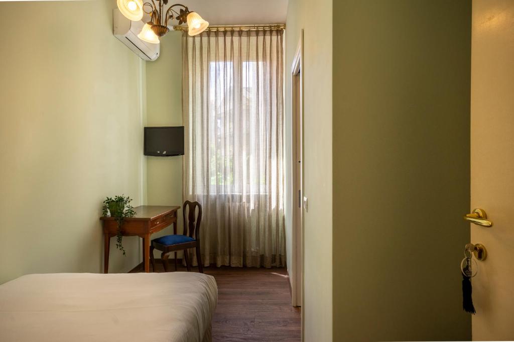 Postel nebo postele na pokoji v ubytování Boutique Hotel Heritage
