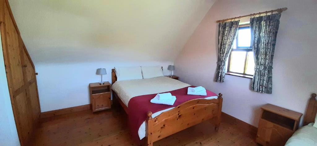 Postel nebo postele na pokoji v ubytování Fanore Holiday Cottages
