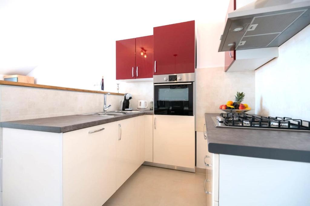 Η κουζίνα ή μικρή κουζίνα στο Apartman Melani