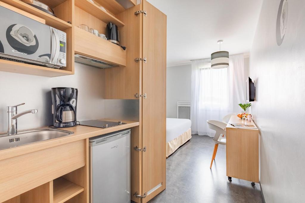 Appart'City Classic Reims Parc des Expositions - Resim 20