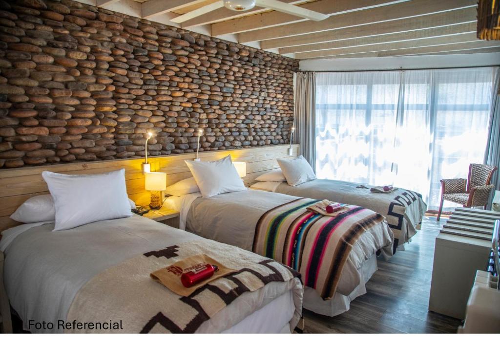 Postel nebo postele na pokoji v ubytování Terrantai Lodge