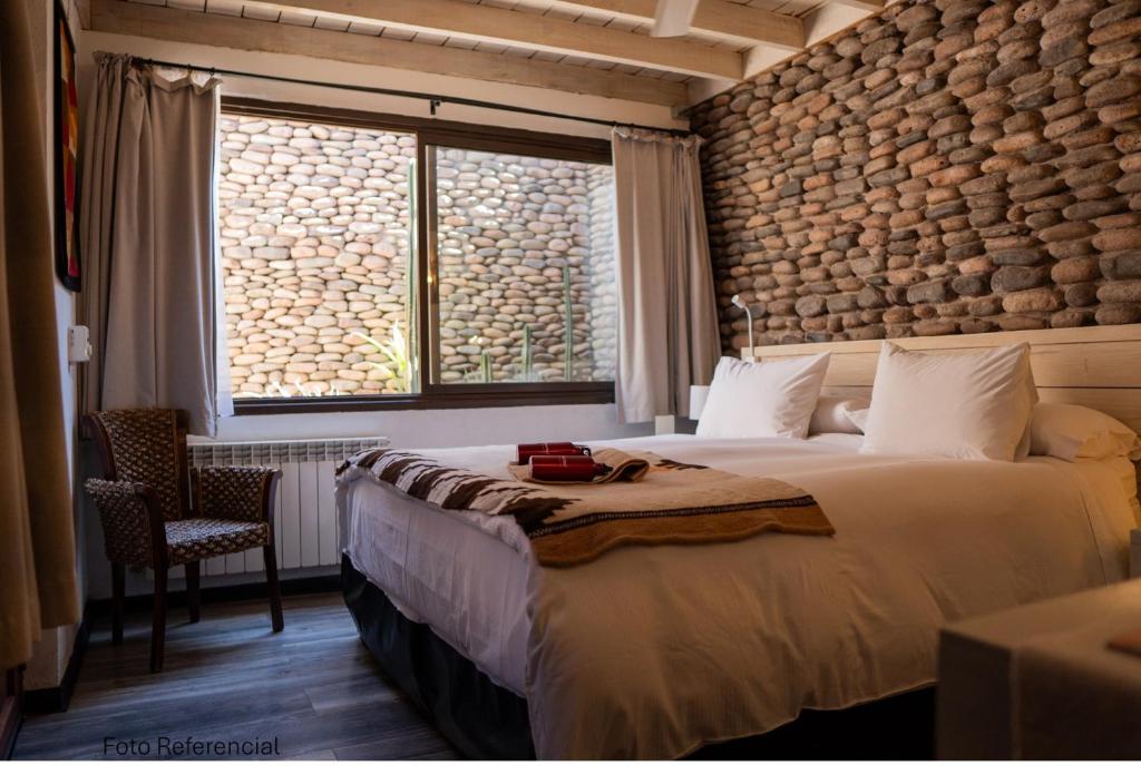 Postel nebo postele na pokoji v ubytování Terrantai Lodge