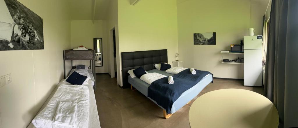 Letto o letti in una camera di Arhus Cottage and Camping