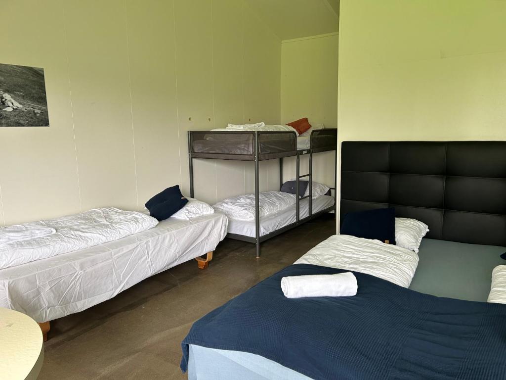 Letto o letti in una camera di Arhus Cottage and Camping