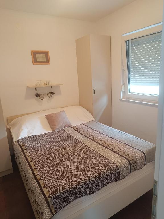 Posteľ alebo postele v izbe v ubytovaní Holiday apartment Boko