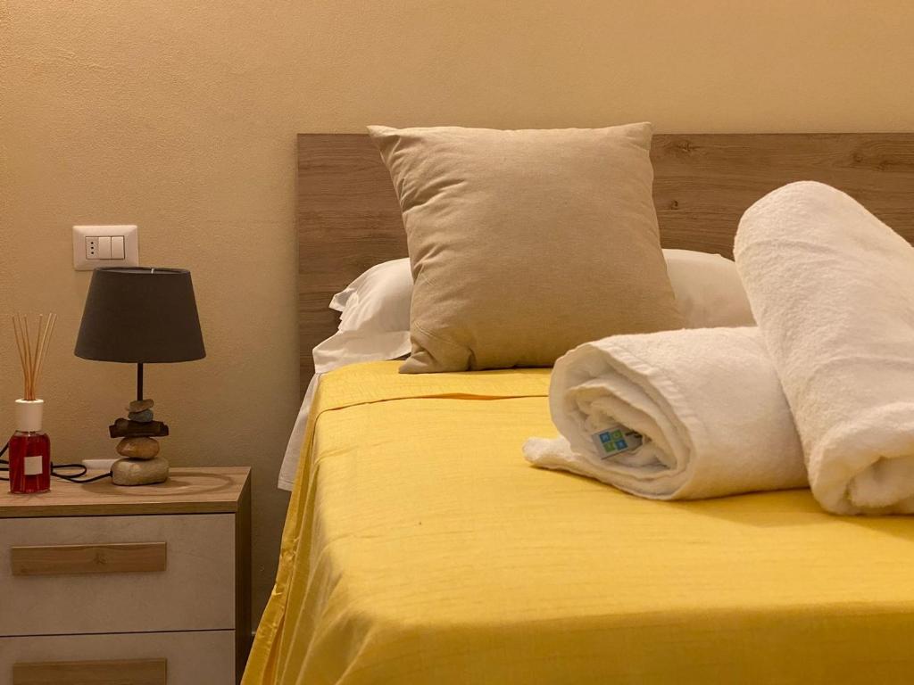Postel nebo postele na pokoji v ubytování Duca D'Aosta