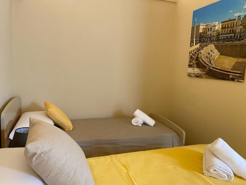 Postel nebo postele na pokoji v ubytování Duca D'Aosta