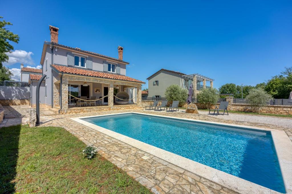 Πισίνα στο ή κοντά στο Villa Miriam