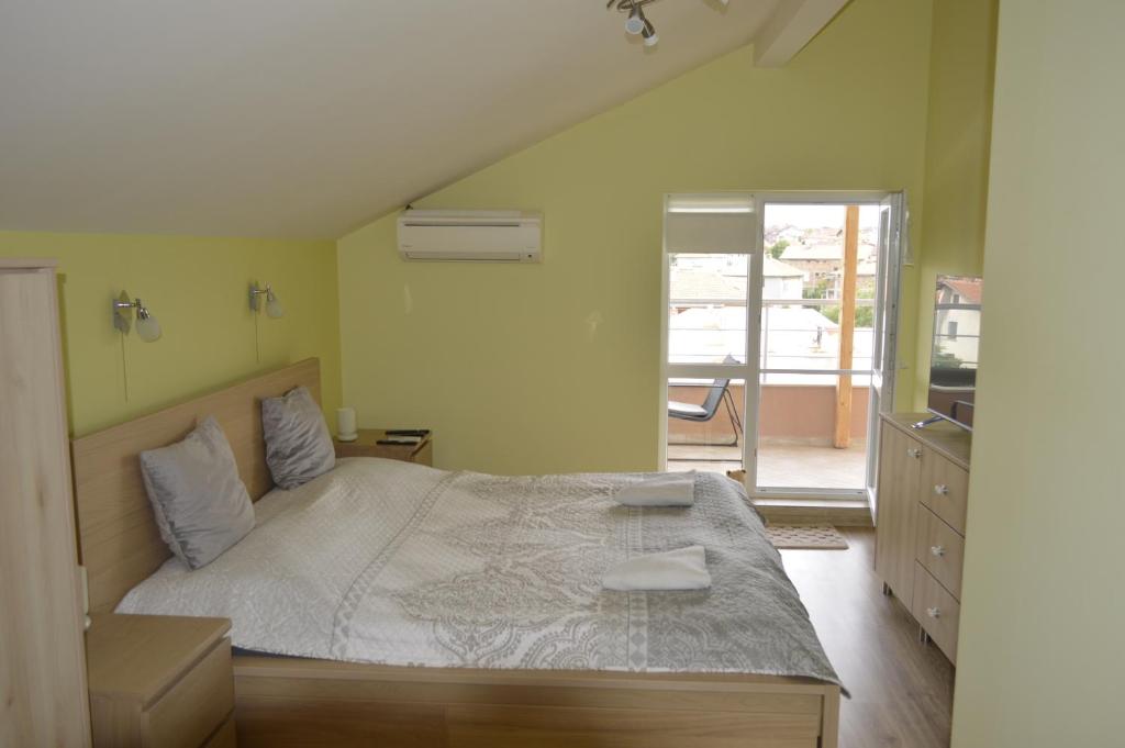 Postel nebo postele na pokoji v ubytování Albatros Comfort like home