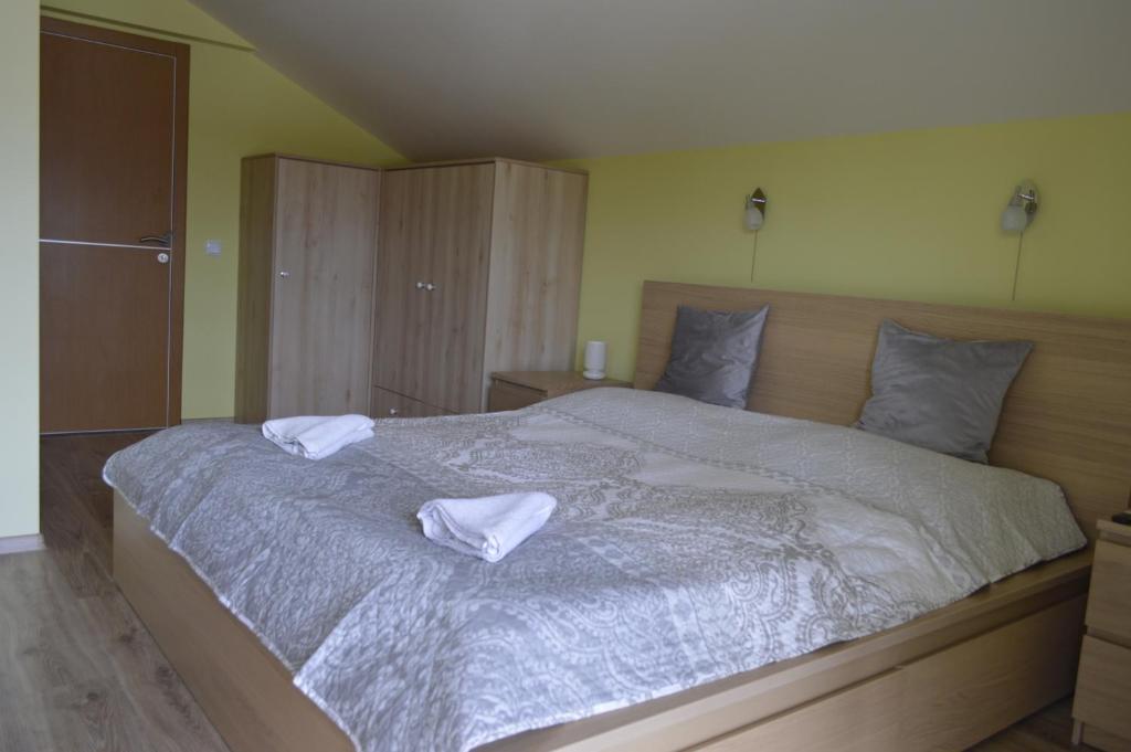 Postel nebo postele na pokoji v ubytování Albatros Comfort like home