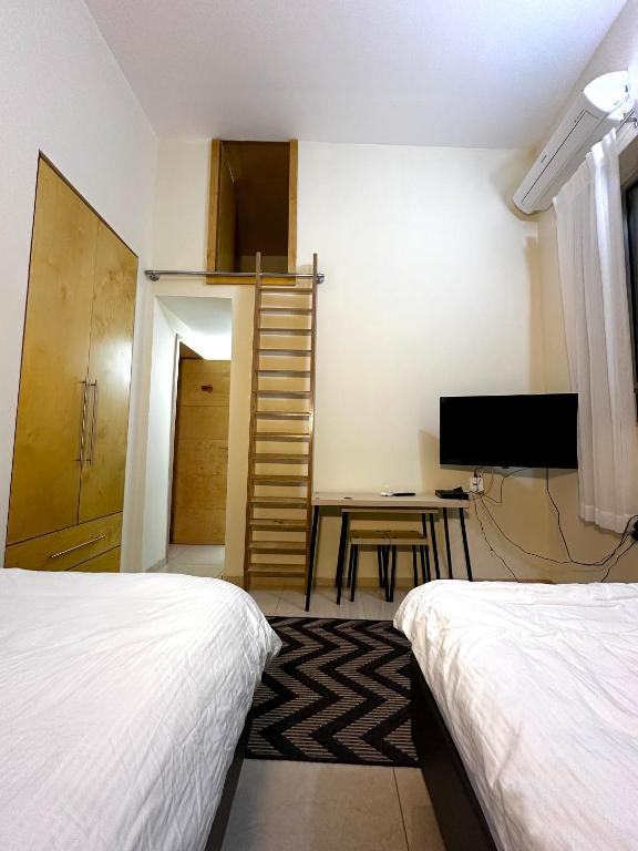 Postel nebo postele na pokoji v ubytování El Sayed House b&b
