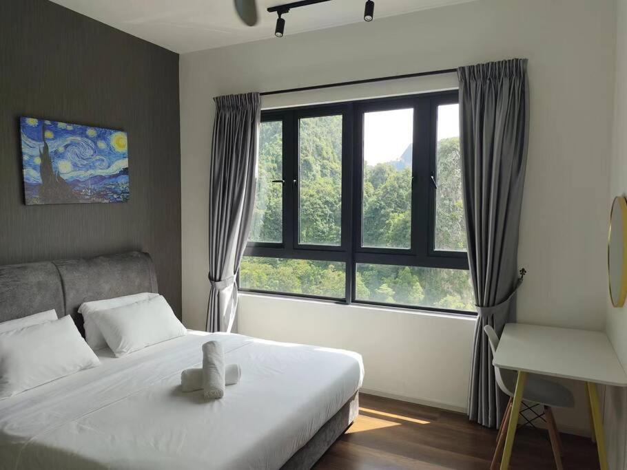 Katil atau katil-katil dalam bilik di ONSTAY Sunway Onsen Suites