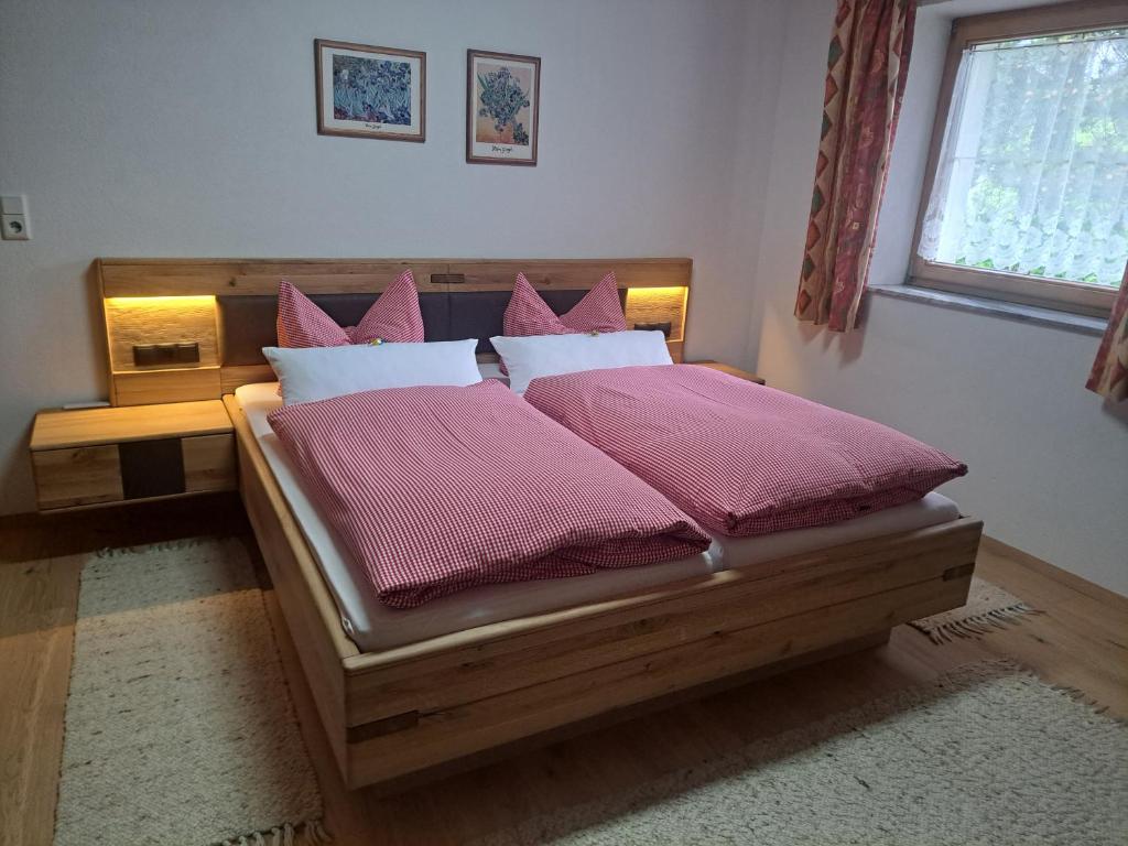 Postel nebo postele na pokoji v ubytování Ferienwohnung Leismüller