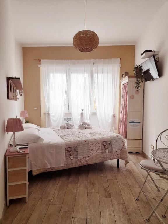 A bed or beds in a room at Il Mare Di Roma