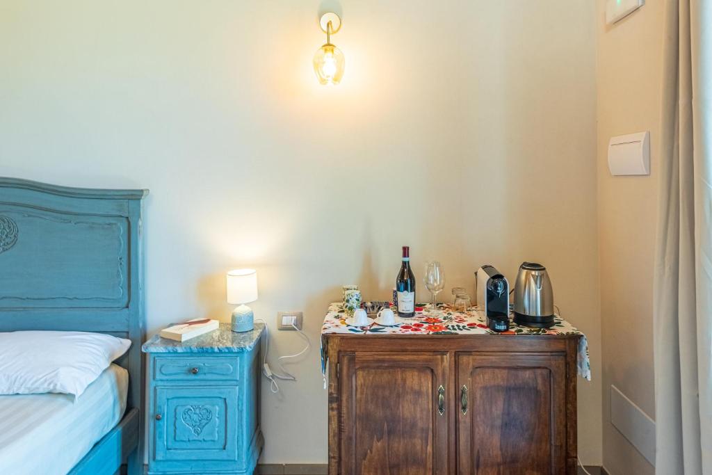 Postel nebo postele na pokoji v ubytování LeCoste rooms, Monforte