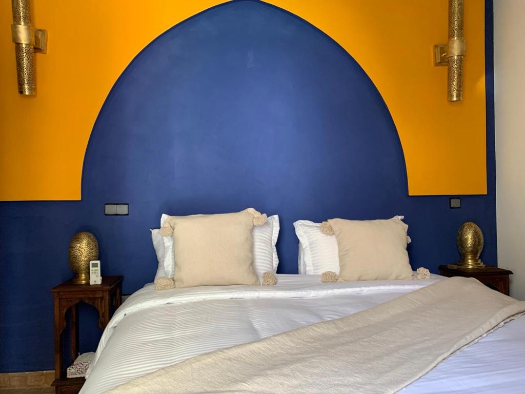 Postel nebo postele na pokoji v ubytování Riad SunSet Marrakech