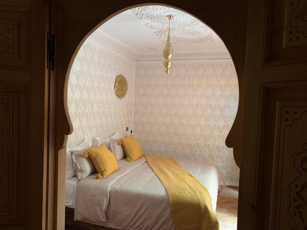 Postel nebo postele na pokoji v ubytování Riad SunSet Marrakech