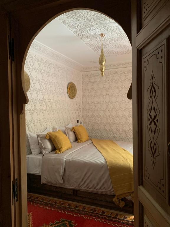 Postel nebo postele na pokoji v ubytování Riad SunSet Marrakech
