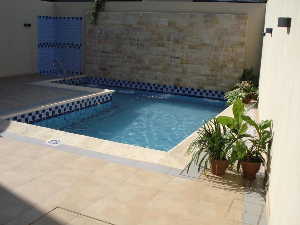Πισίνα στο ή κοντά στο Olimpo Hotel & Suites