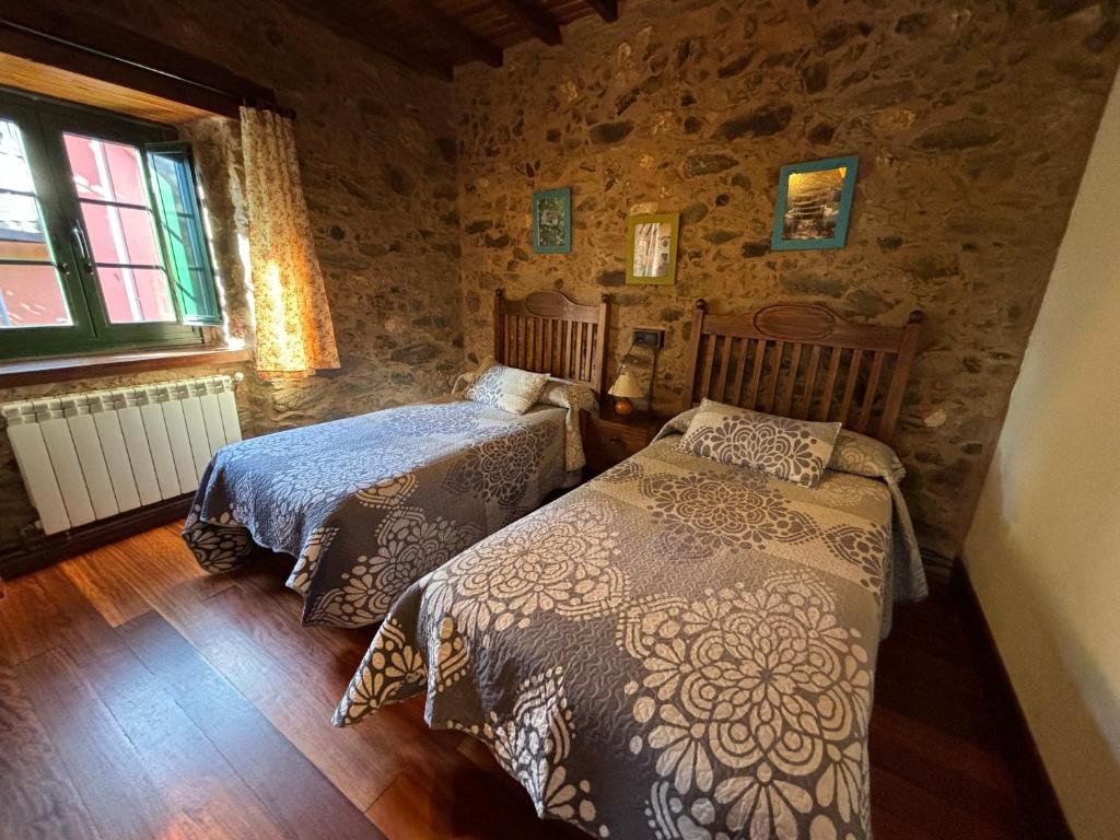 Postel nebo postele na pokoji v ubytování Eira de Bergondo