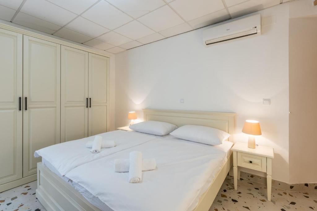 Postel nebo postele na pokoji v ubytování Old Town B&B Rooms Matusko
