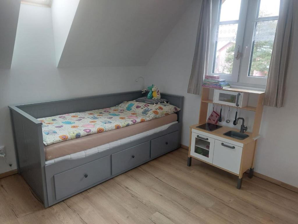 Postel nebo postele na pokoji v ubytování Apartmány Ema a Ela