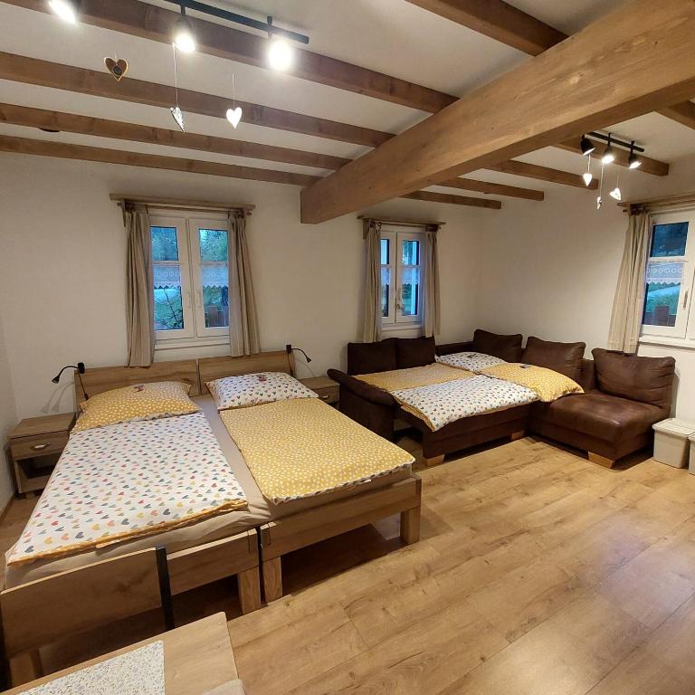Postel nebo postele na pokoji v ubytování Apartmány Ema a Ela