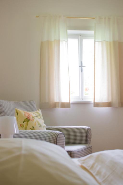 Postel nebo postele na pokoji v ubytování Ferienhaus Koglegg