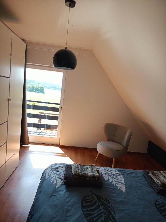 Voodi või voodid majutusasutuse Chalet avec vue unique toas