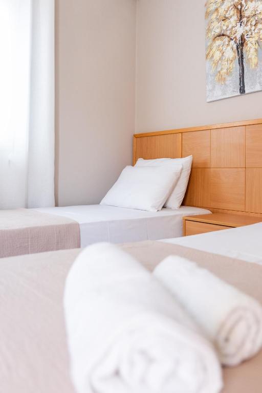 Łóżko lub łóżka w pokoju w obiekcie Romeo apartment