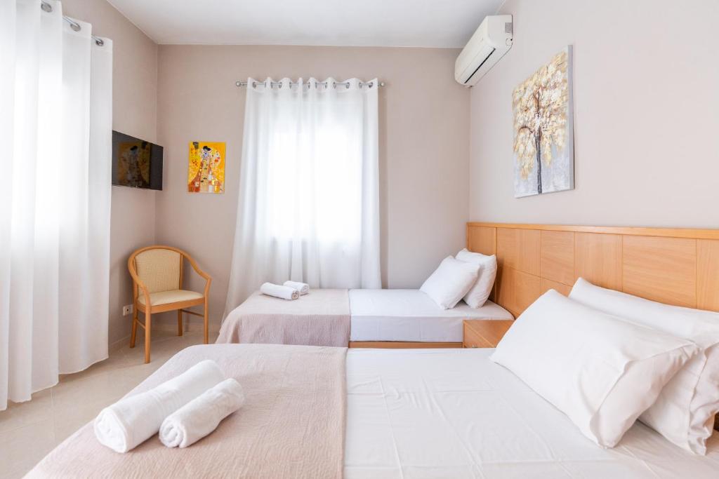 Łóżko lub łóżka w pokoju w obiekcie Romeo apartment